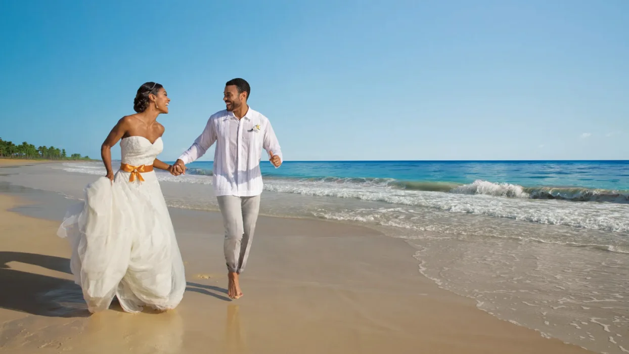 couple on the beach at dreams resort