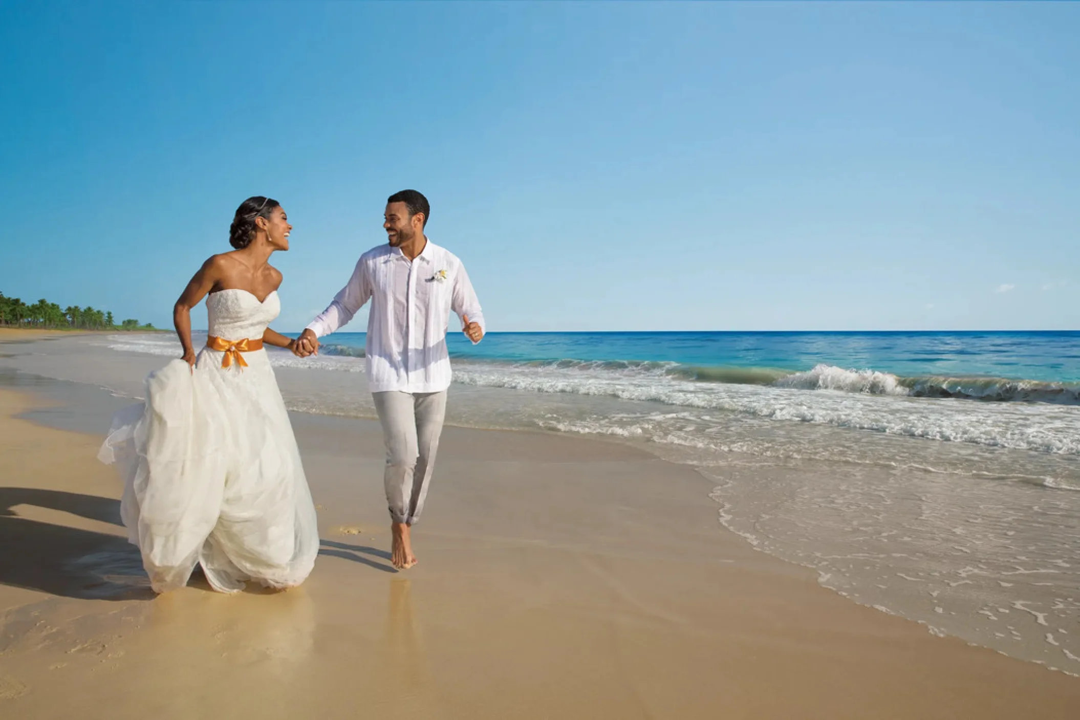 couple on the beach at dreams resort