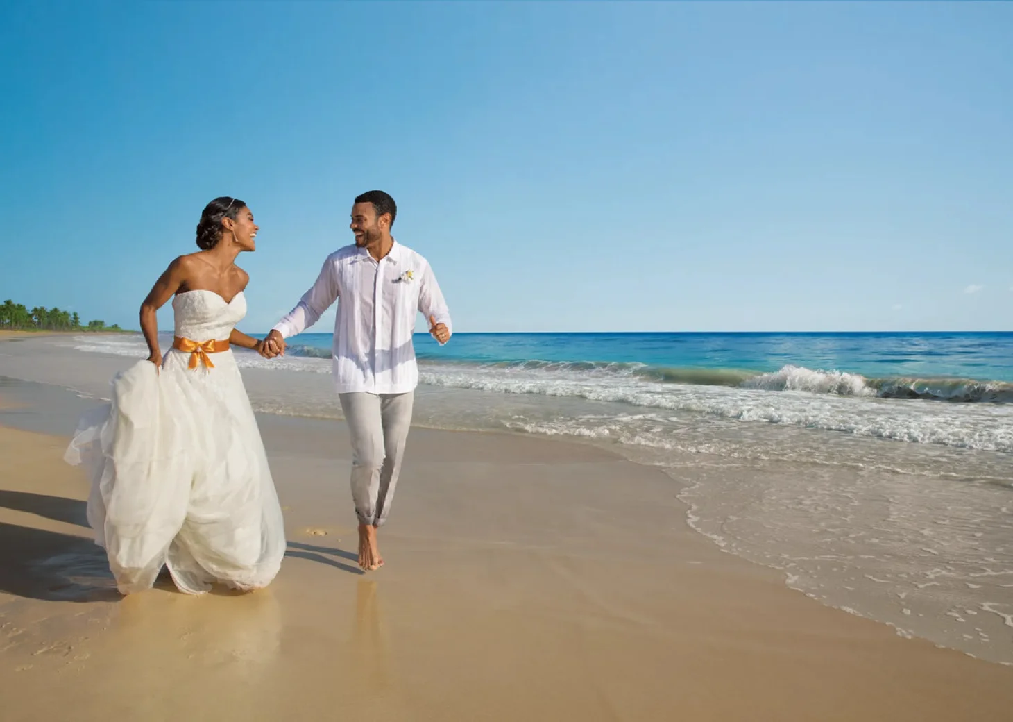 couple on the beach at dreams resort