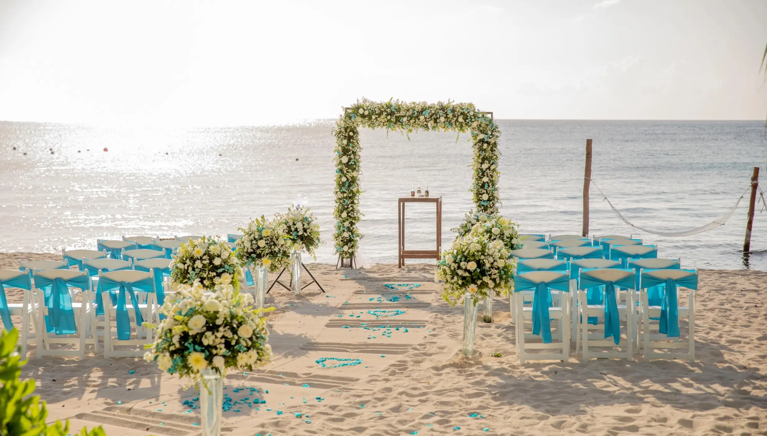 beach wedding setup at Dreams Cozumel Cape Resort & Spa
