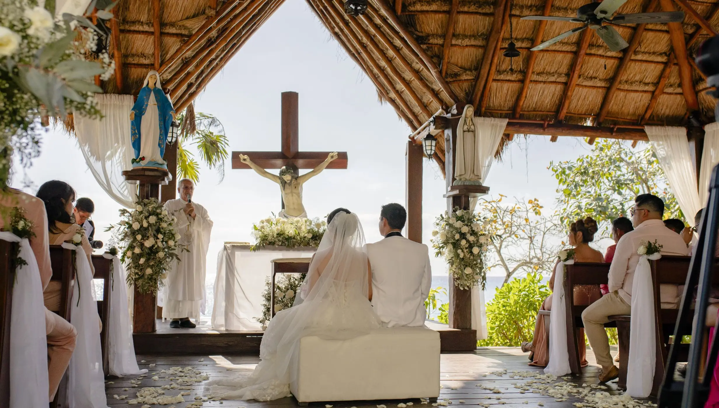 bride and groom at the catholic chapel at dreams cozumel cape resort