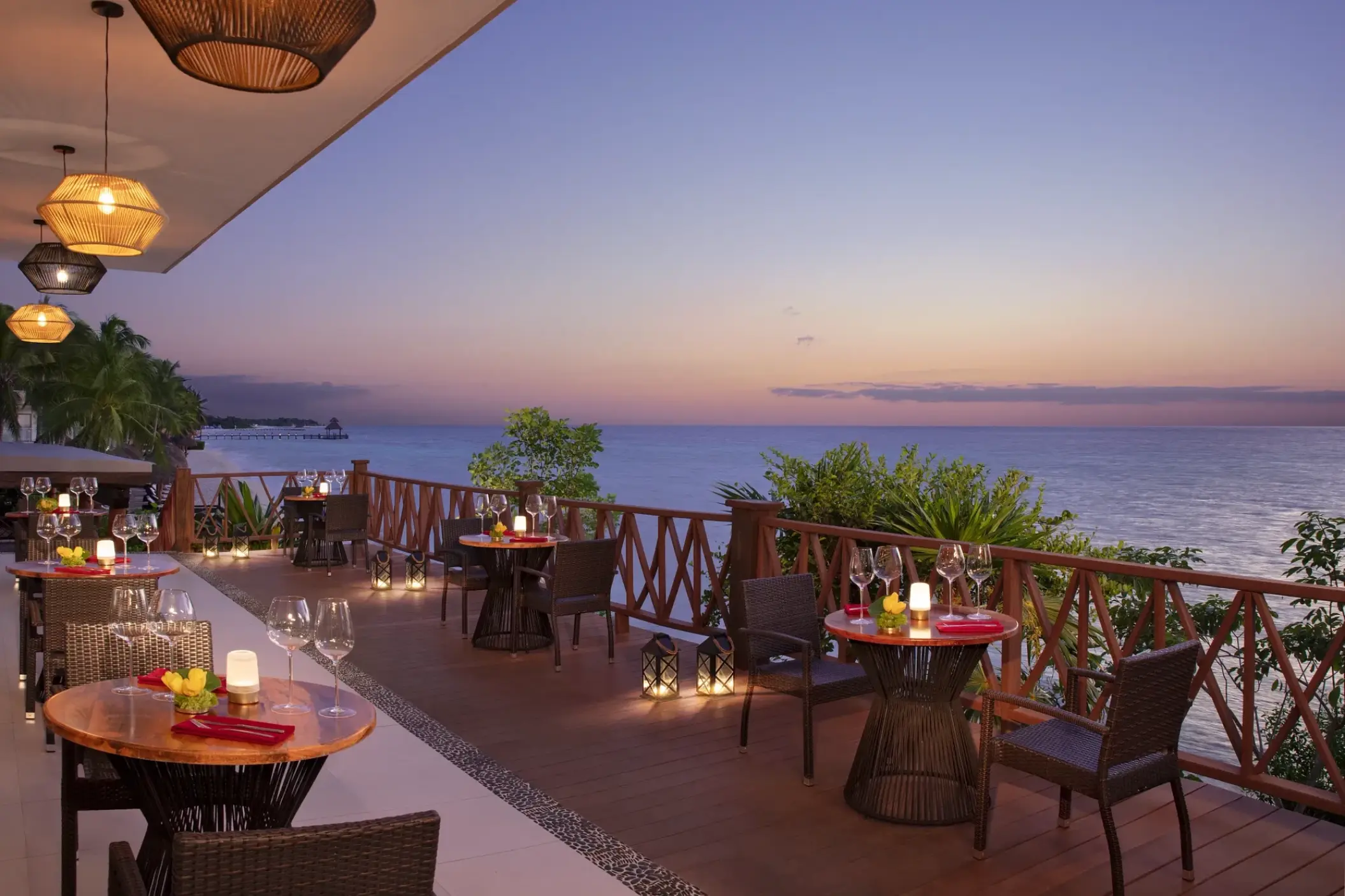 Annatto terrace restaurant at Dreams Cozumel Cape overlooking the ocean at sunset, Cozumel
