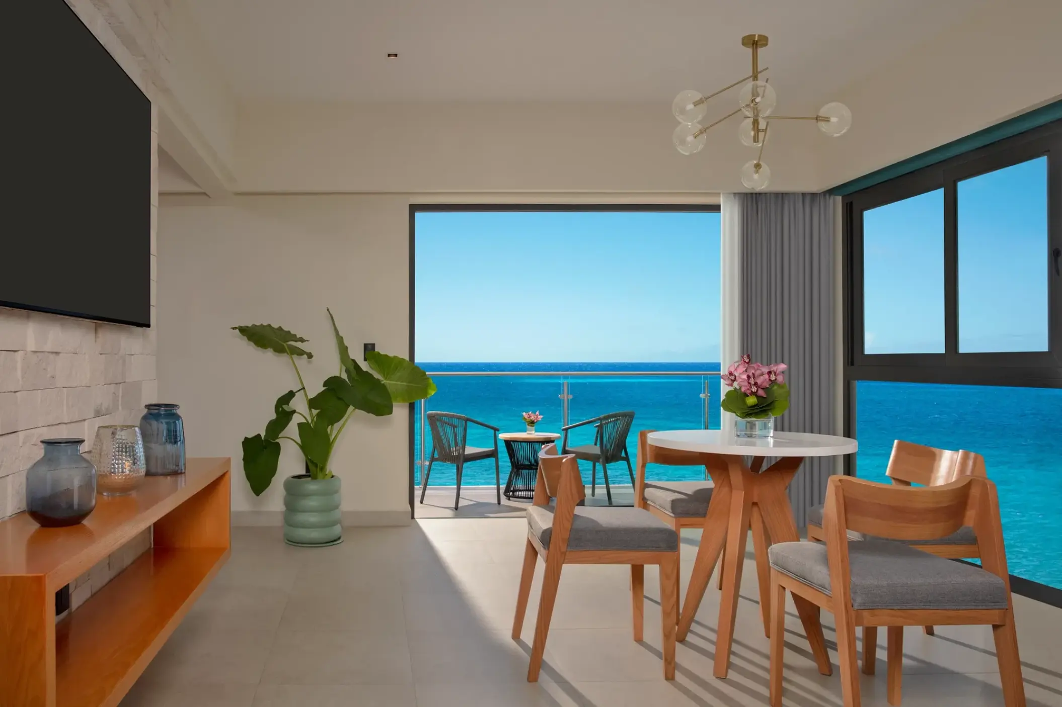 Master suite living area and balcony with ocean views at Dreams Cozumel, Cozumel