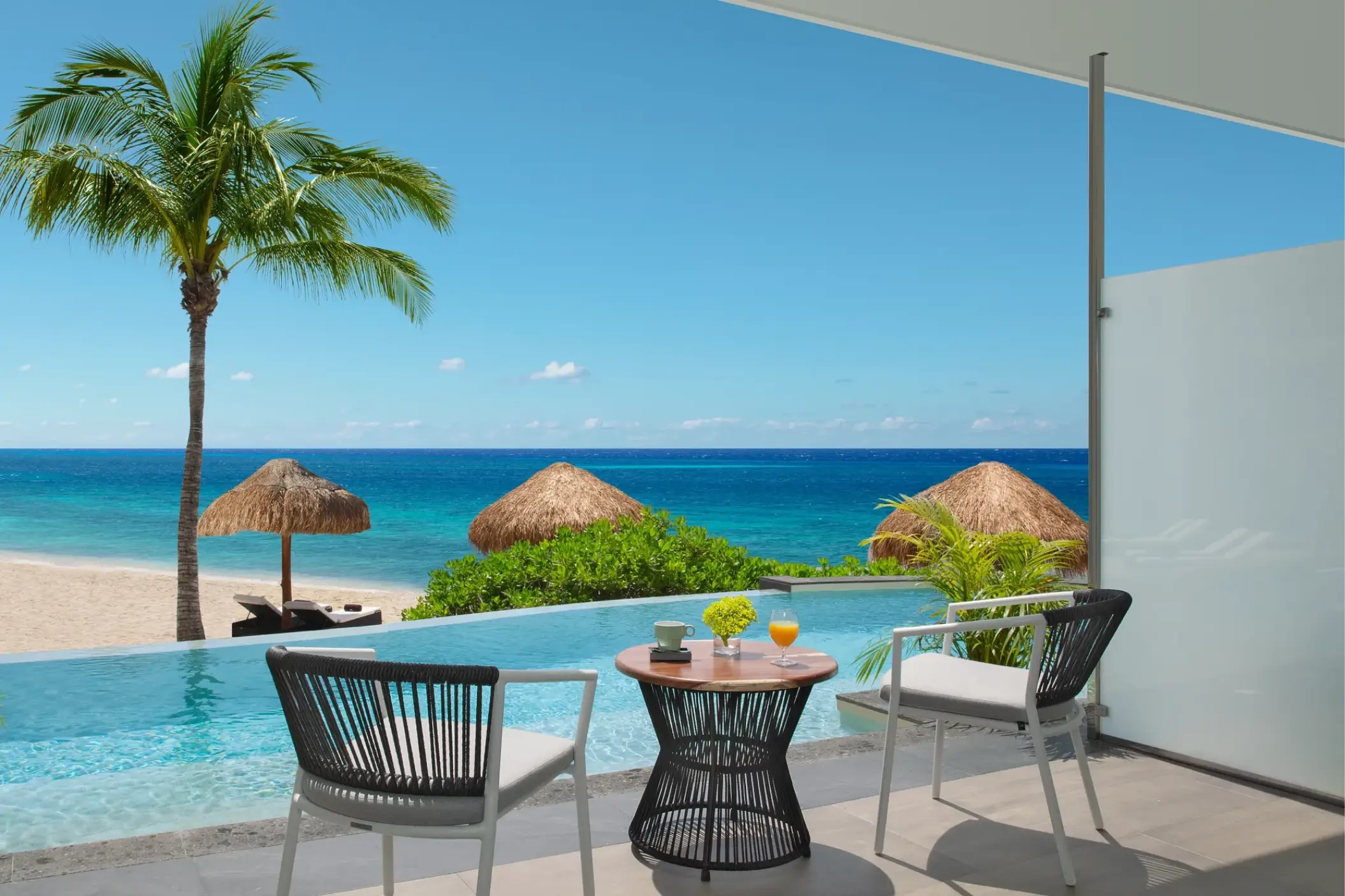Junior suite beachfront swim-out balcony at Dreams Cozumel, Cozumel