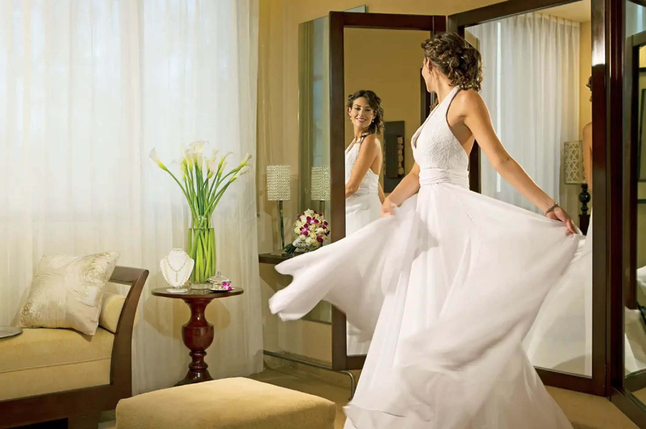 Bride getting ready in a bridal suite at Dreams Cozumel Cape, Cozumel