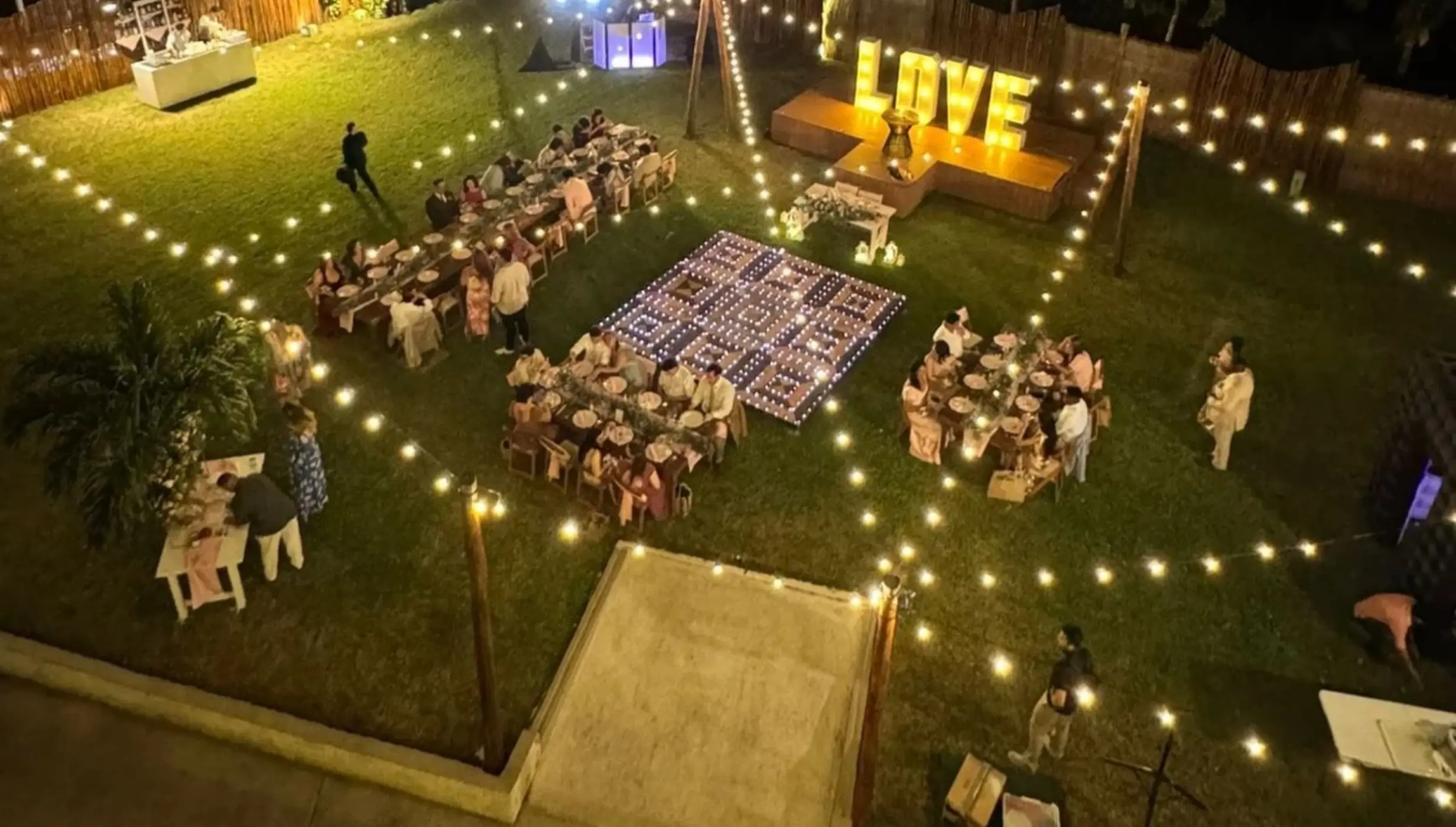 garden venue lit up in the evening at Dreams cozumel cape resort