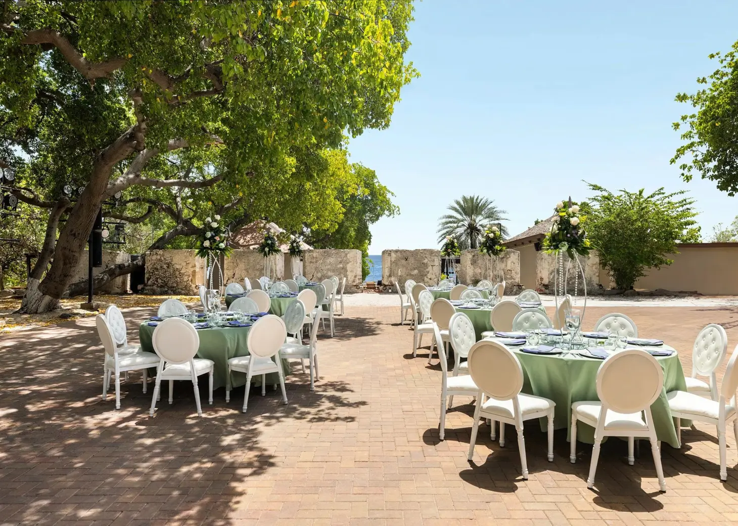 Outdoor wedding reception at the 18th-century fort venue at Dreams Curacao, Willemstad