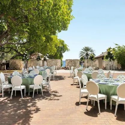 Outdoor wedding reception at the 18th-century fort venue at Dreams Curacao, Willemstad