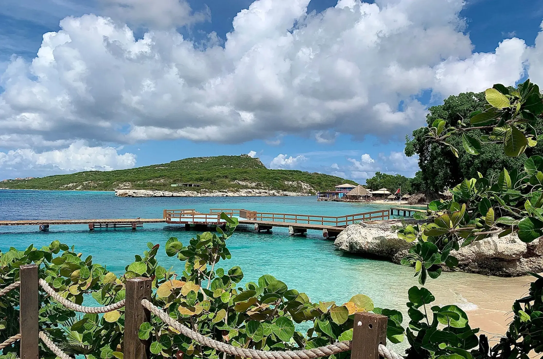 Wooden pier over turquoise water at Dreams Curacao, Willemstad