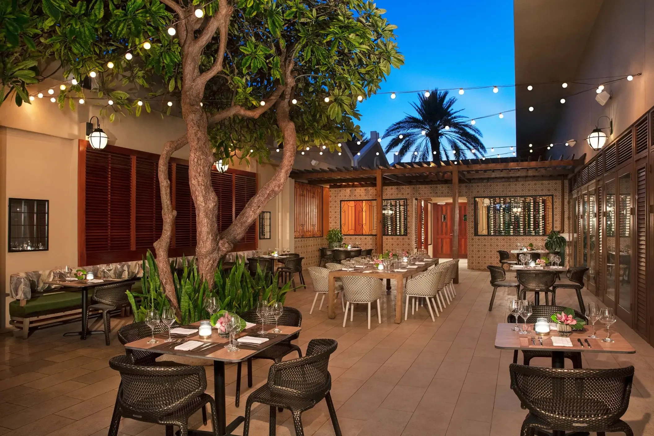 Portofino restaurant outdoor terrace with string lights at Dreams Curacao, Willemstad