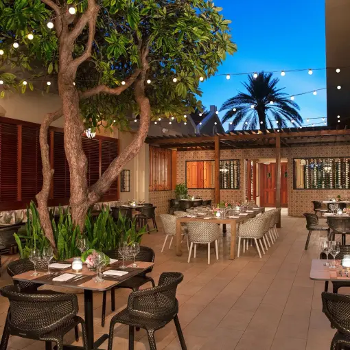 Portofino restaurant outdoor terrace with string lights at Dreams Curacao, Willemstad