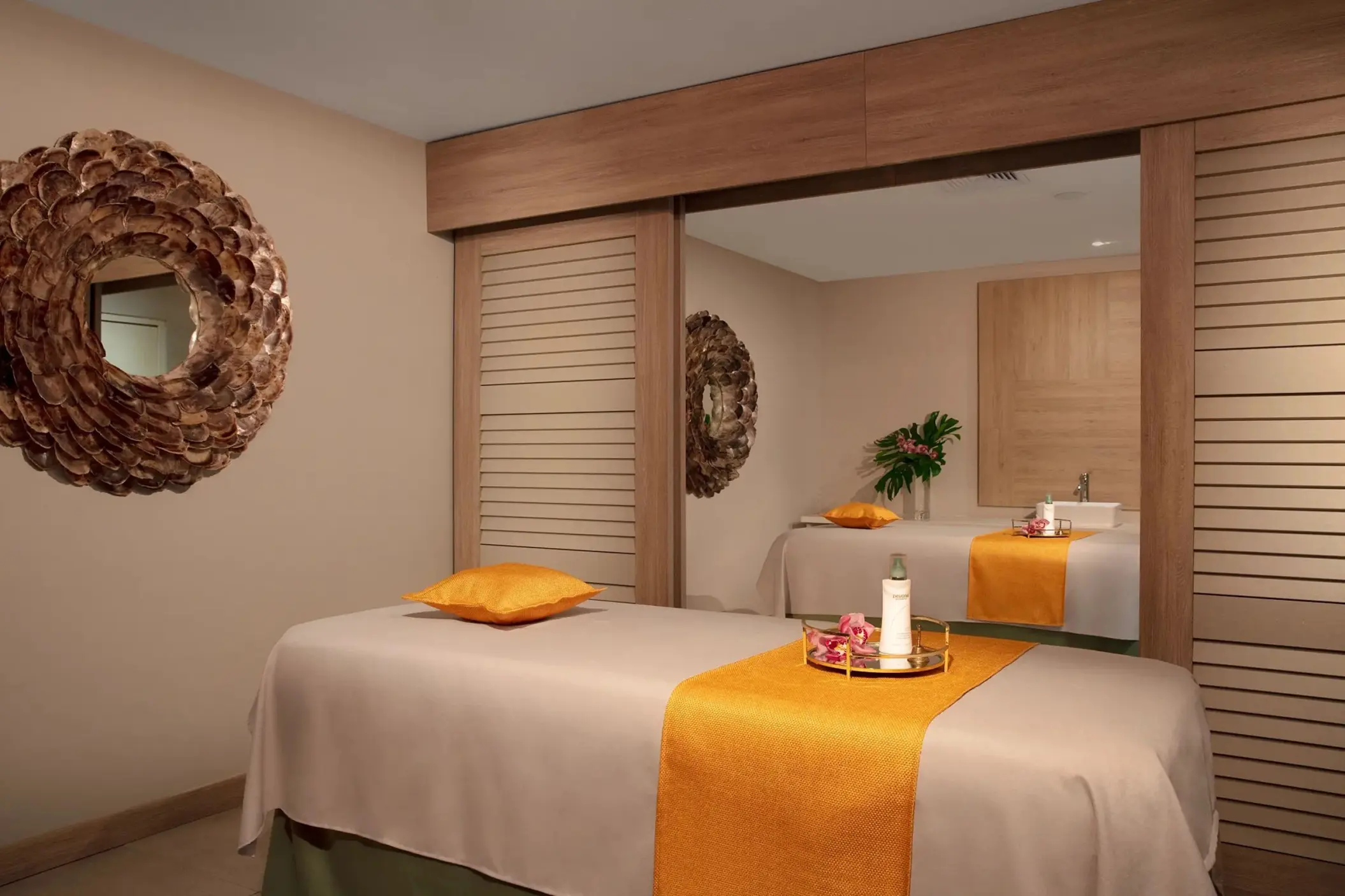 Spa treatment room with massage table at Dreams Curacao, Willemstad