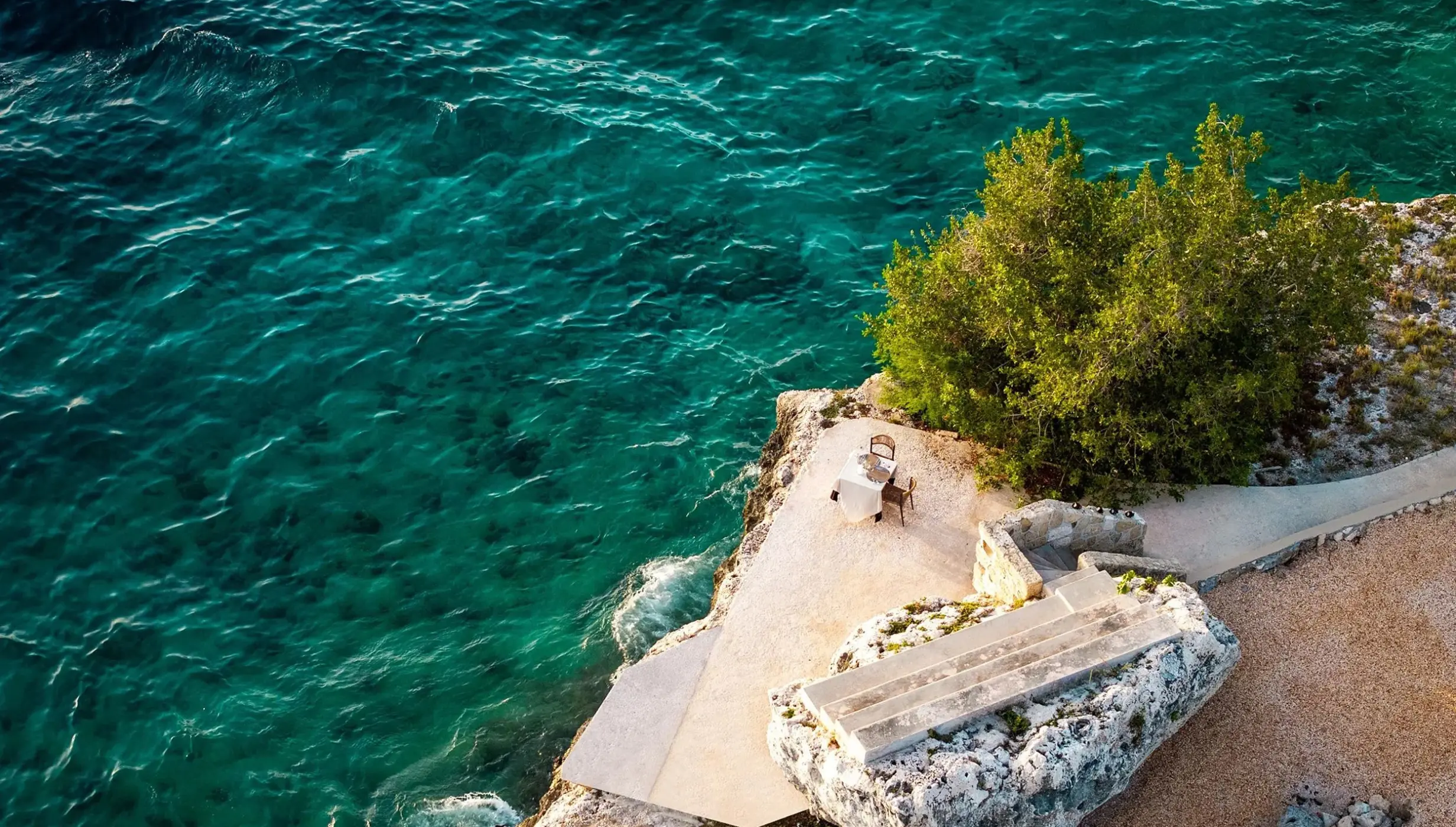 Aerial view of the Sunset Rock wedding ceremony venue at Dreams Curacao, Willemstad