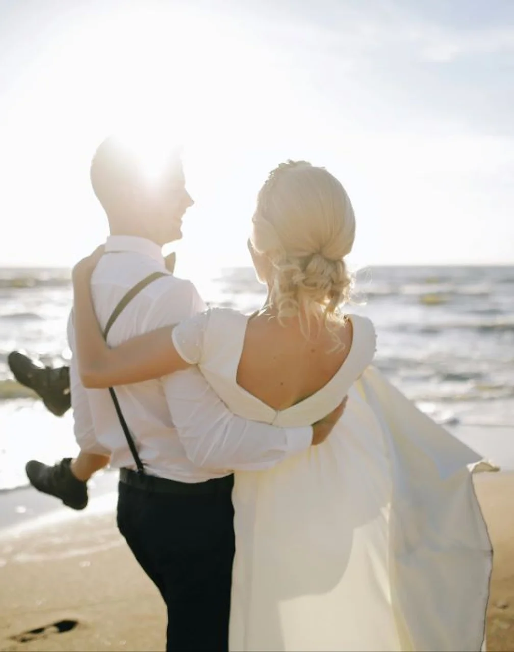 bride and groom on the beach