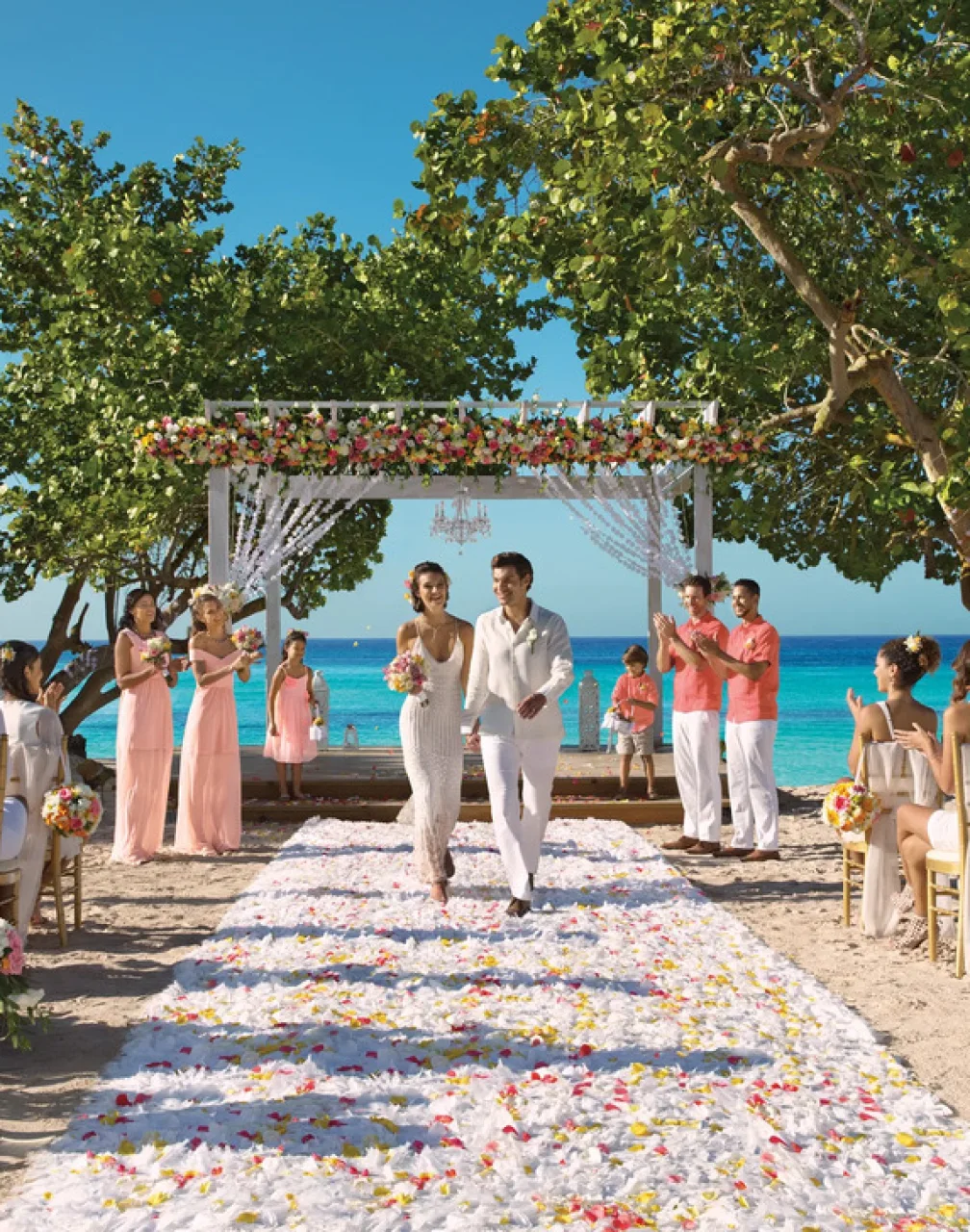 bride groom and guests at the beach gazebo at Dreams Dominicus La Romana