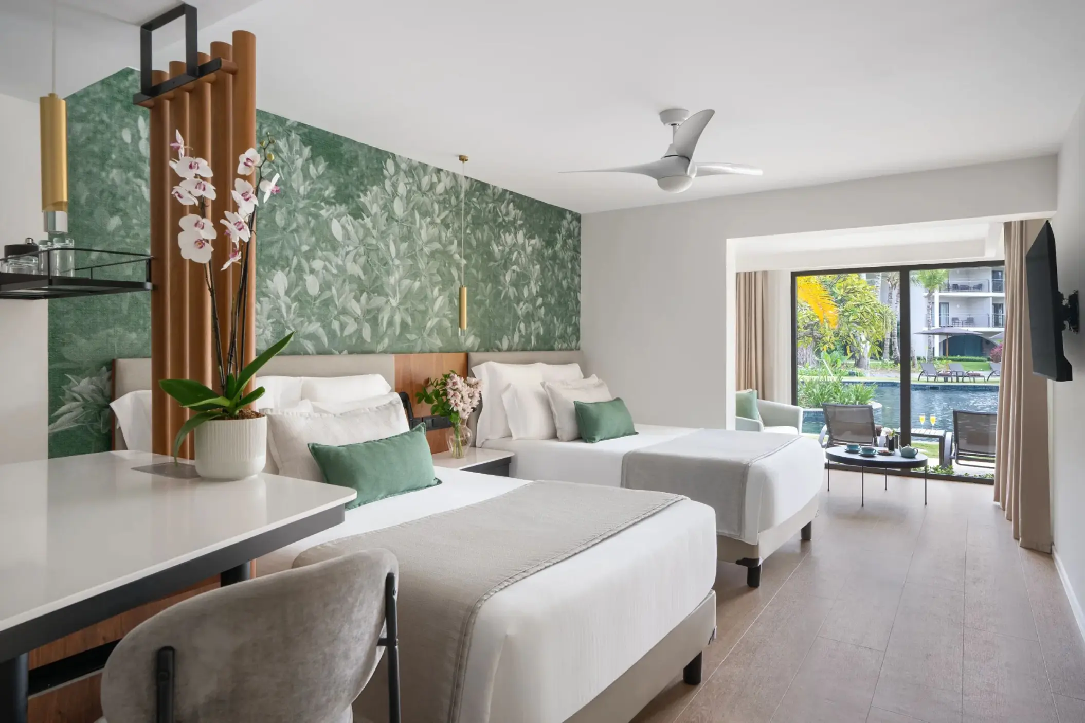 Junior suite with two double beds and swim-out pool access at Dreams Flora, Punta Cana