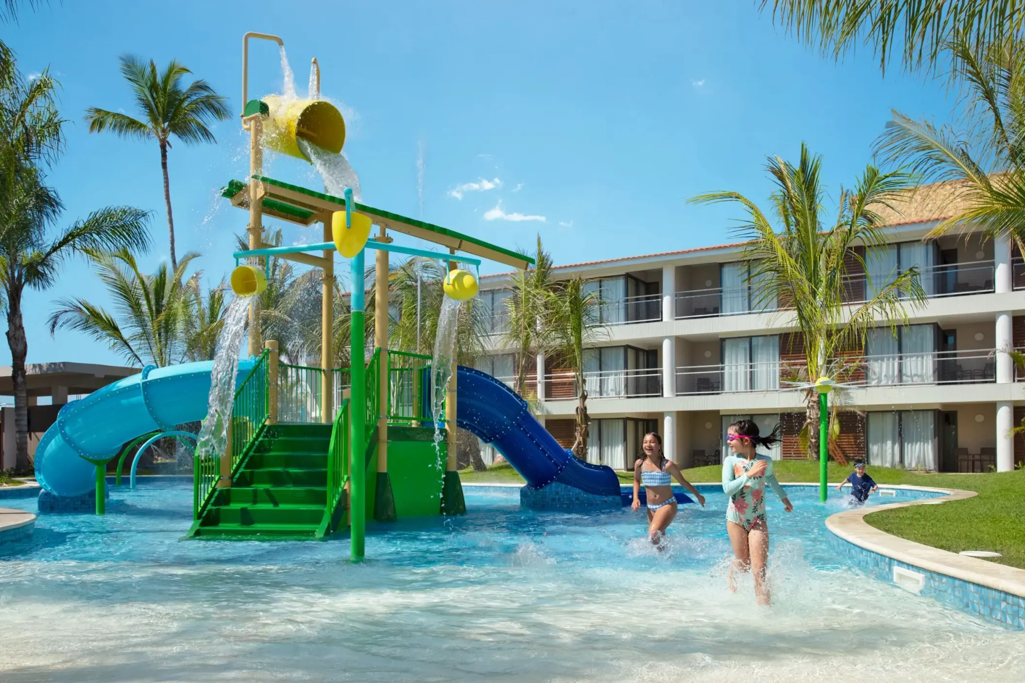 Children playing in the waterpark at Dreams Flora, Punta Cana