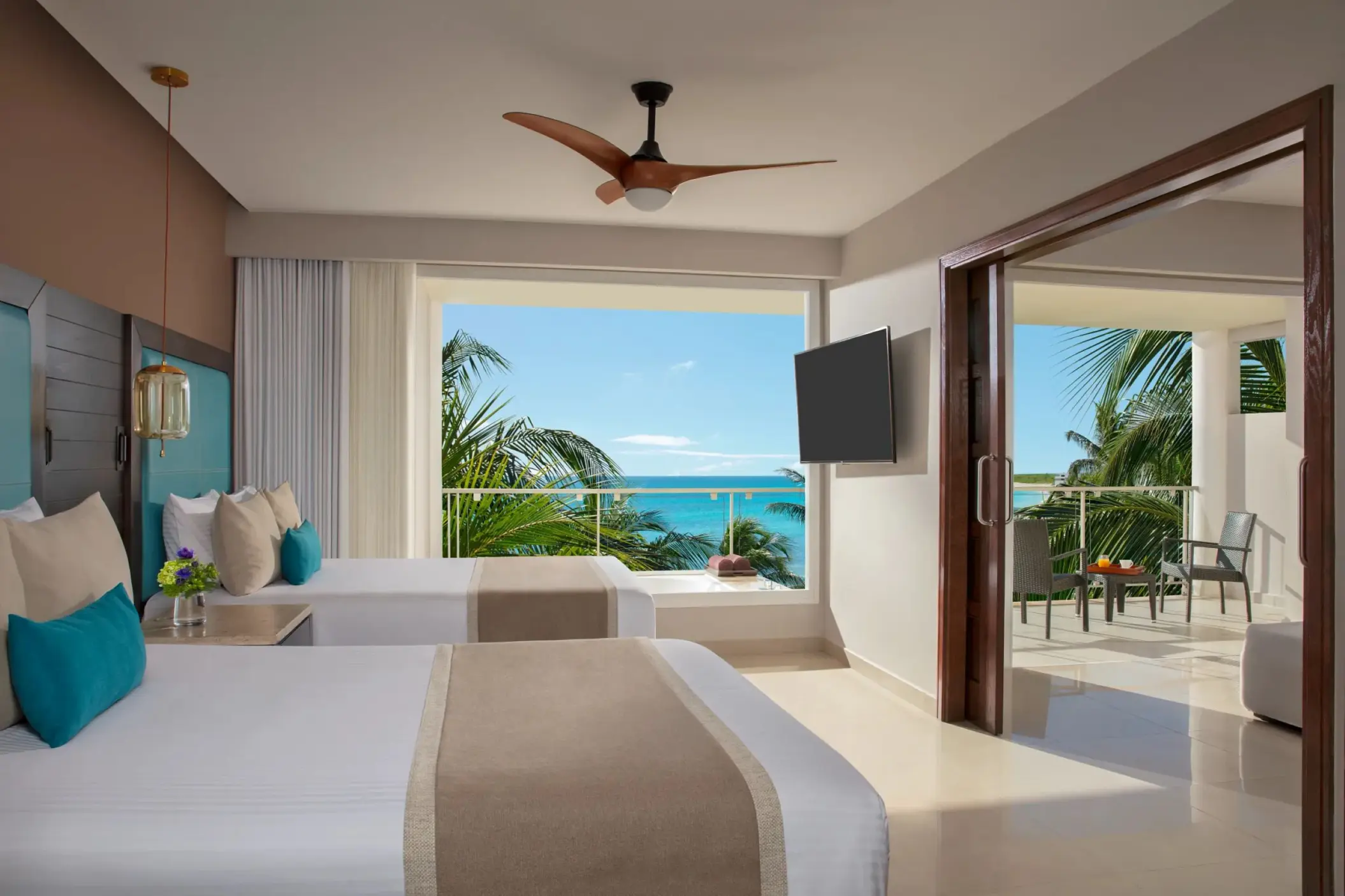 Preferred Club suite with double beds and ocean-view balcony at Dreams Jade, Riviera Maya