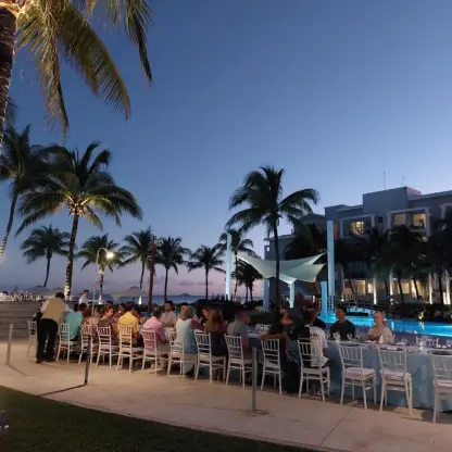 Evening wedding reception on the Tequila Pool Terraza at Dreams Jade, Riviera Maya