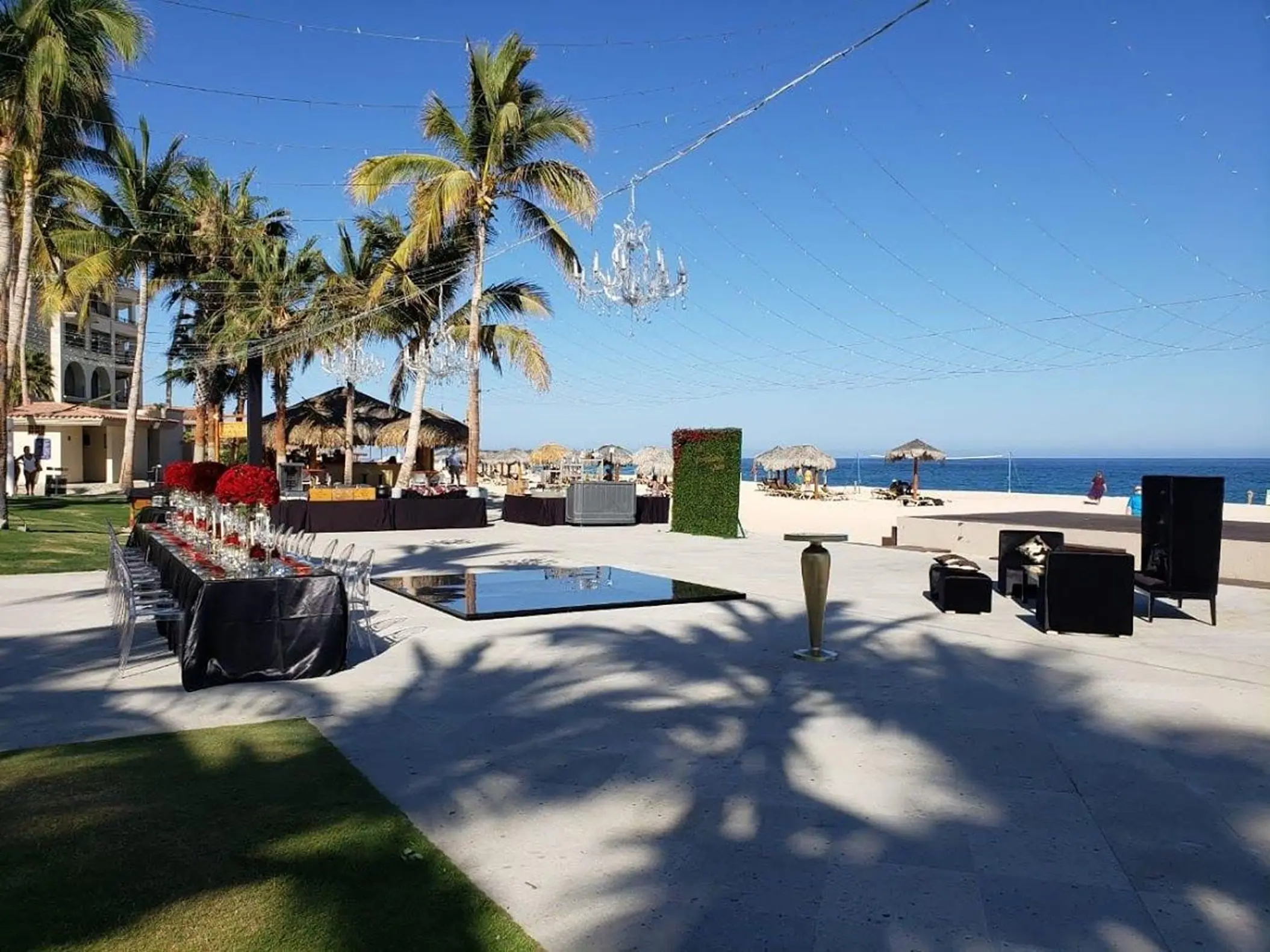 Cascade Terrace wedding reception setup with dance floor at Dreams Los Cabos, Cabo San Lucas