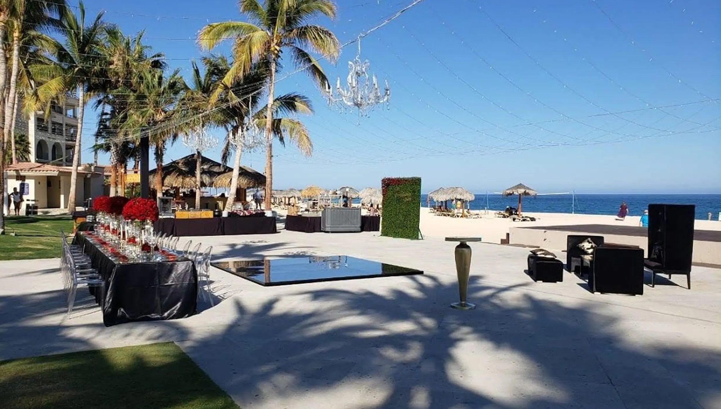 Cascade Terrace wedding reception setup with dance floor at Dreams Los Cabos, Cabo San Lucas