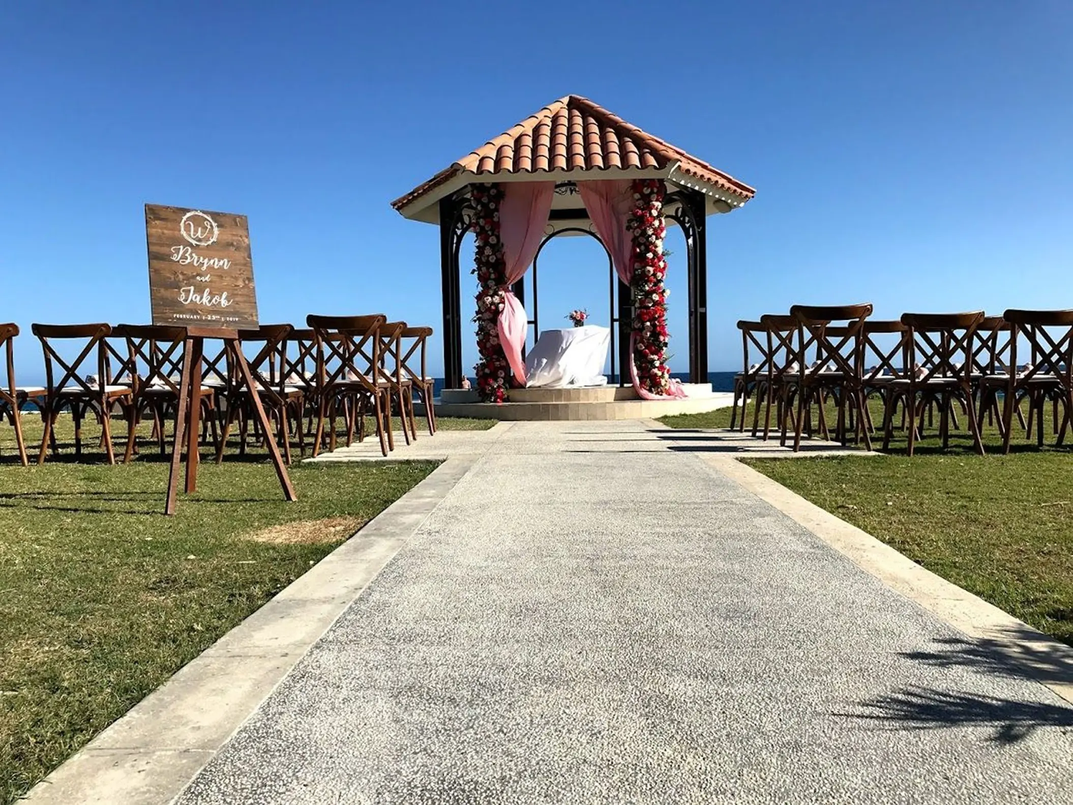 Stone aisle leading to a wedding gazebo ceremony at Dreams Los Cabos, Cabo San Lucas