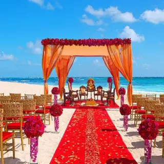 Colorful Mandap for a beach wedding at Dreams Playa Esmeralda, Miches