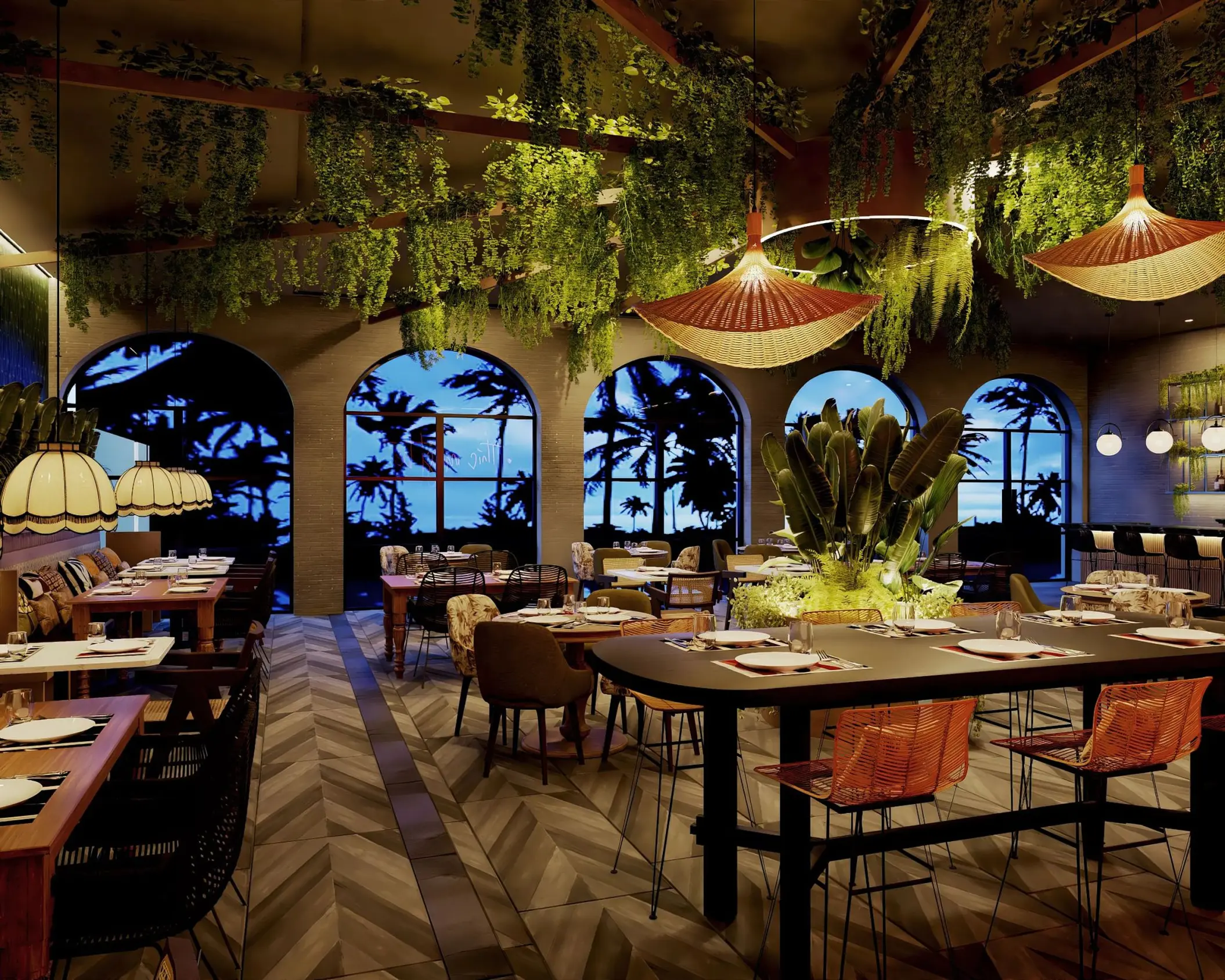 Tierra restaurant with hanging greenery and arched windows at Dreams Playa Esmeralda, Miches