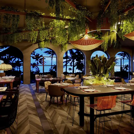Tierra restaurant with hanging greenery and arched windows at Dreams Playa Esmeralda, Miches