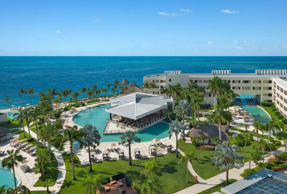 aerial view of dreams puerto morelos with its pools and buildings and beach