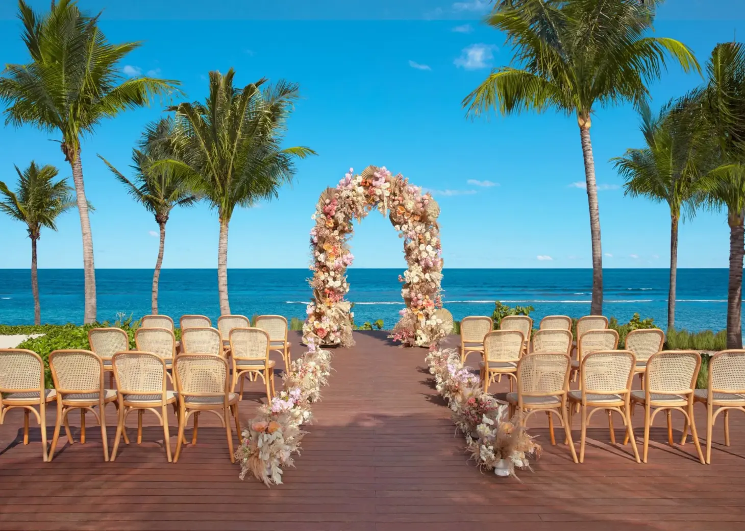 Beachfront wedding ceremony at Dreams Puerto Morelos, Riviera Maya