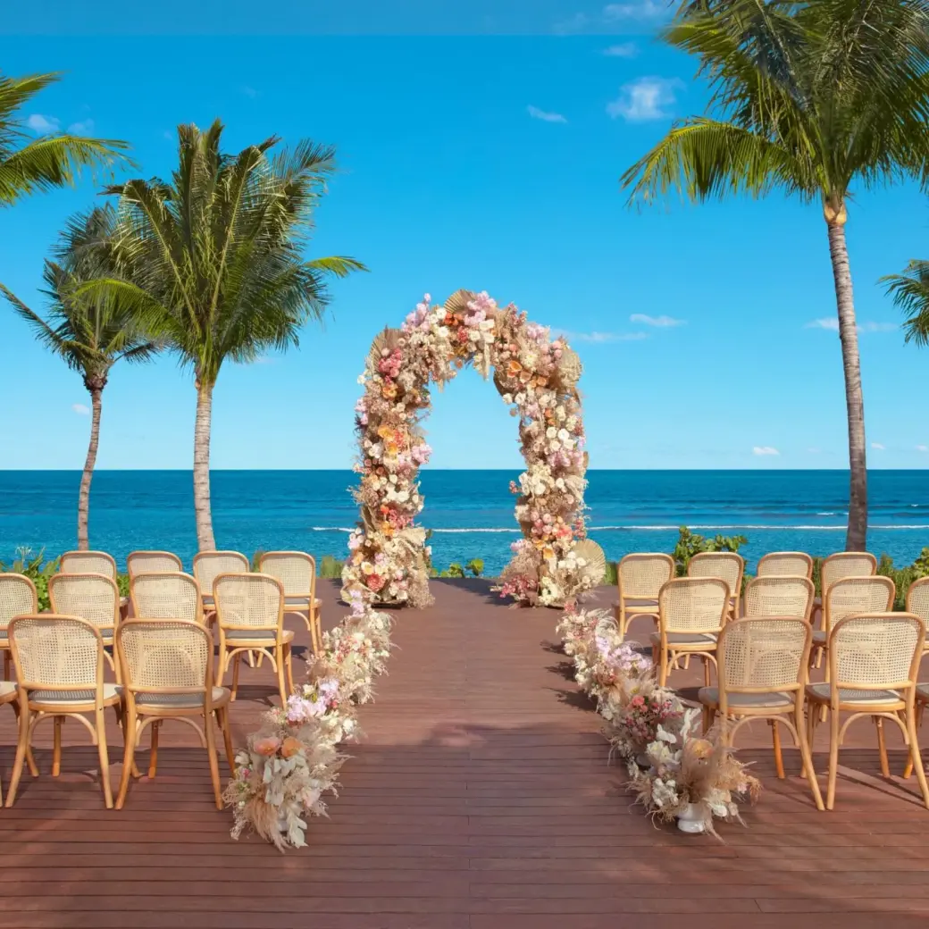 Beachfront wedding ceremony at Dreams Puerto Morelos, Riviera Maya