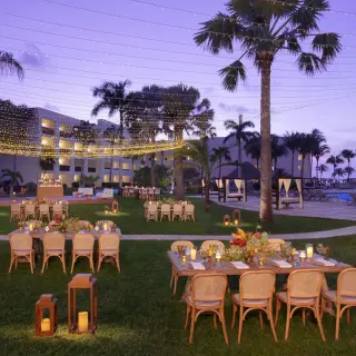 Guava Garden wedding reception with string lights at Dreams Puerto Morelos, Riviera Maya
