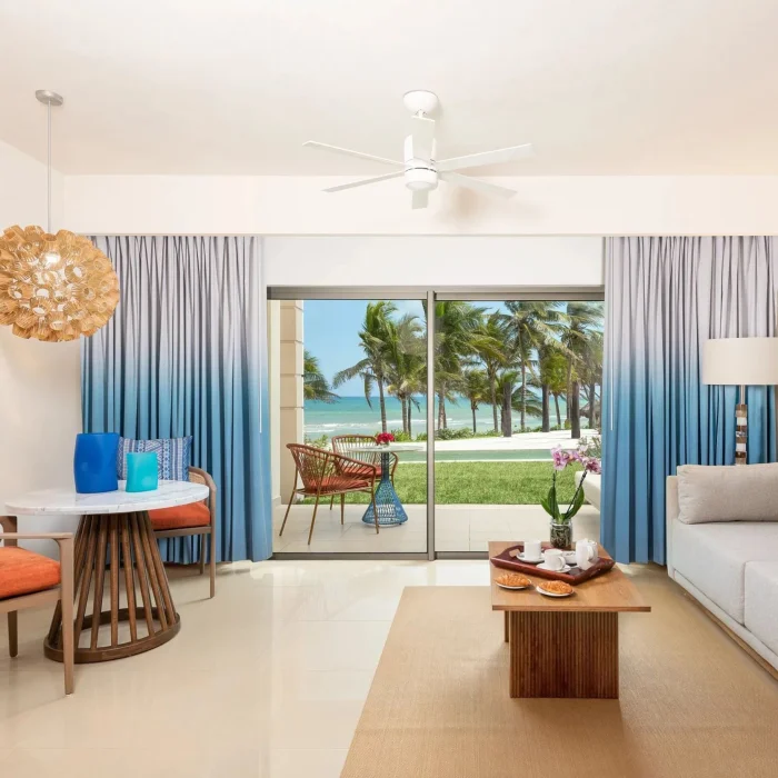 living room of suite at Dreams Puerto Morelos Resort & Spa