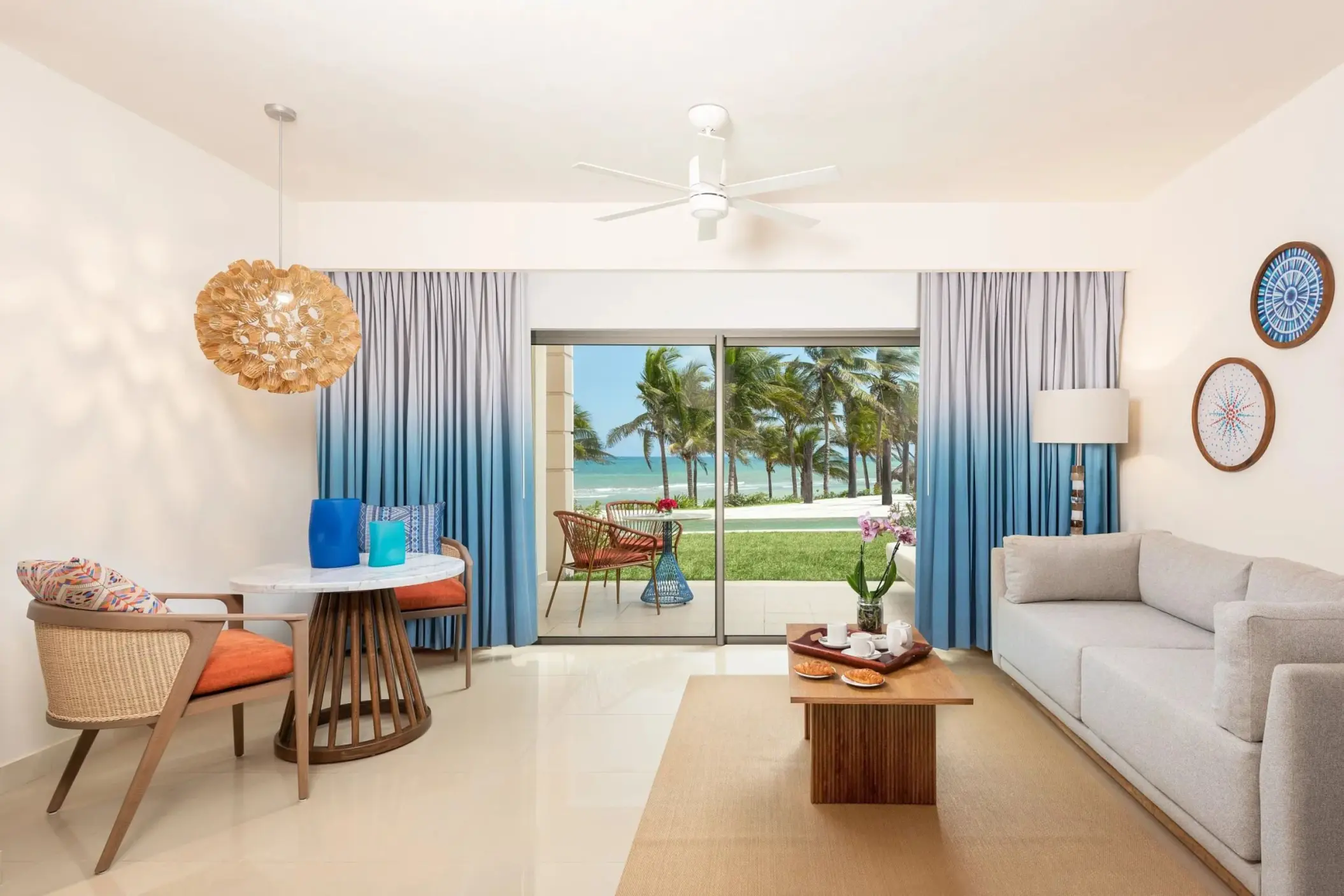 Living room of a suite at Dreams Puerto Morelos, Riviera Maya