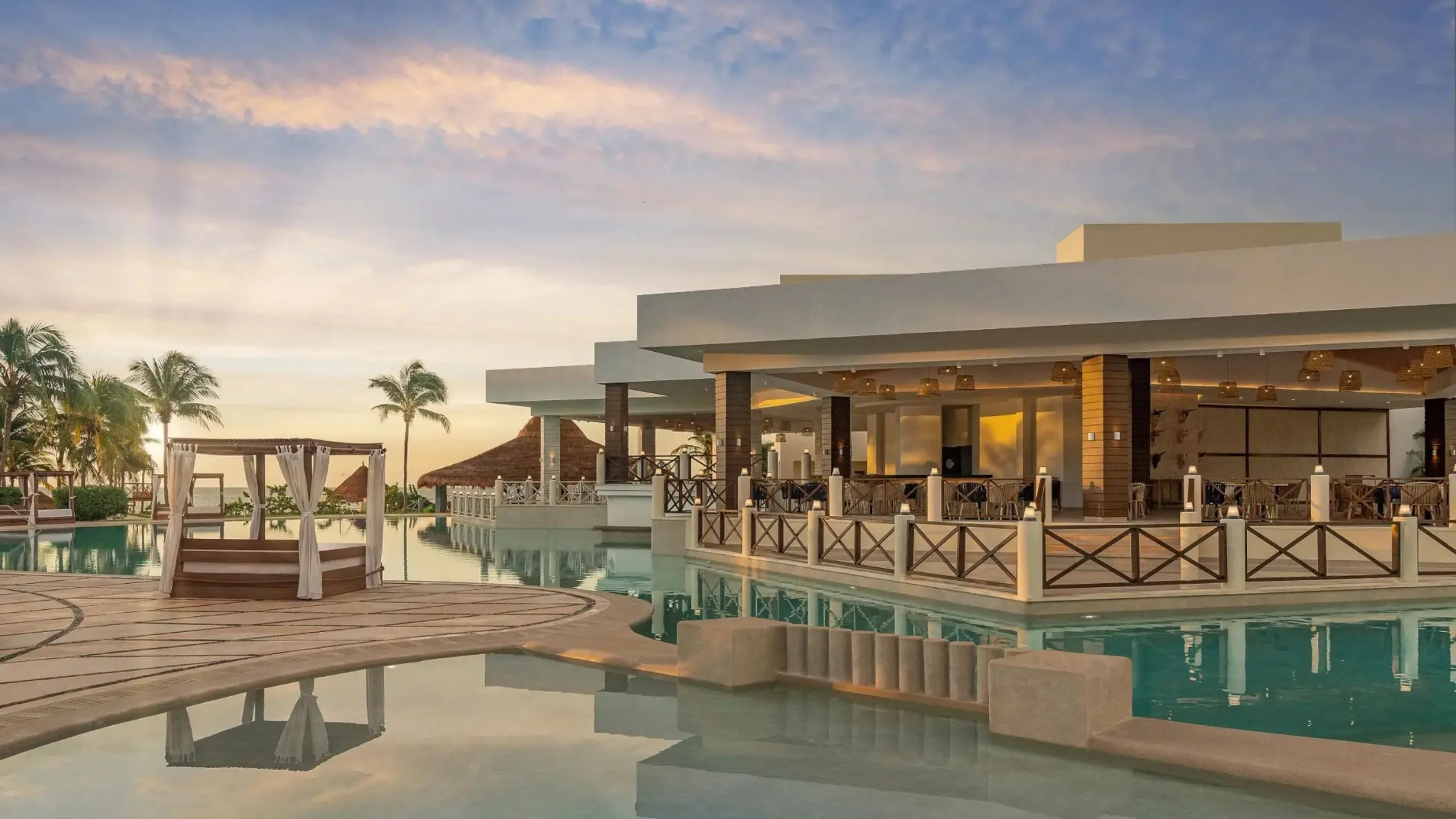 Main pool and poolside restaurant at Dreams Puerto Morelos, Riviera Maya