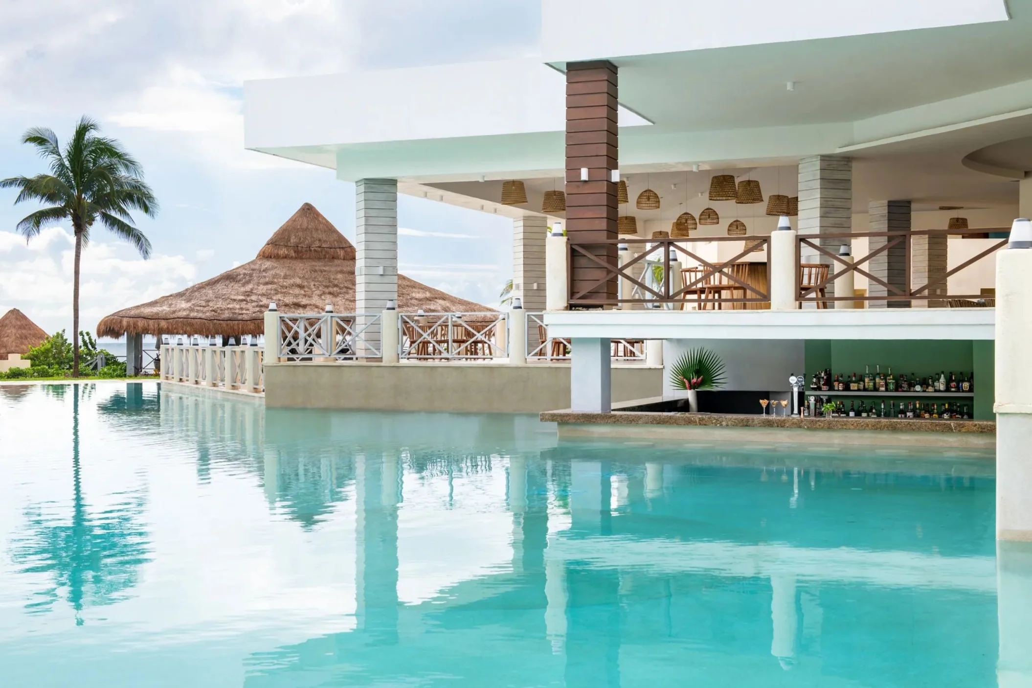swim-up bar at Dreams Puerto Morelos Resort & Spa