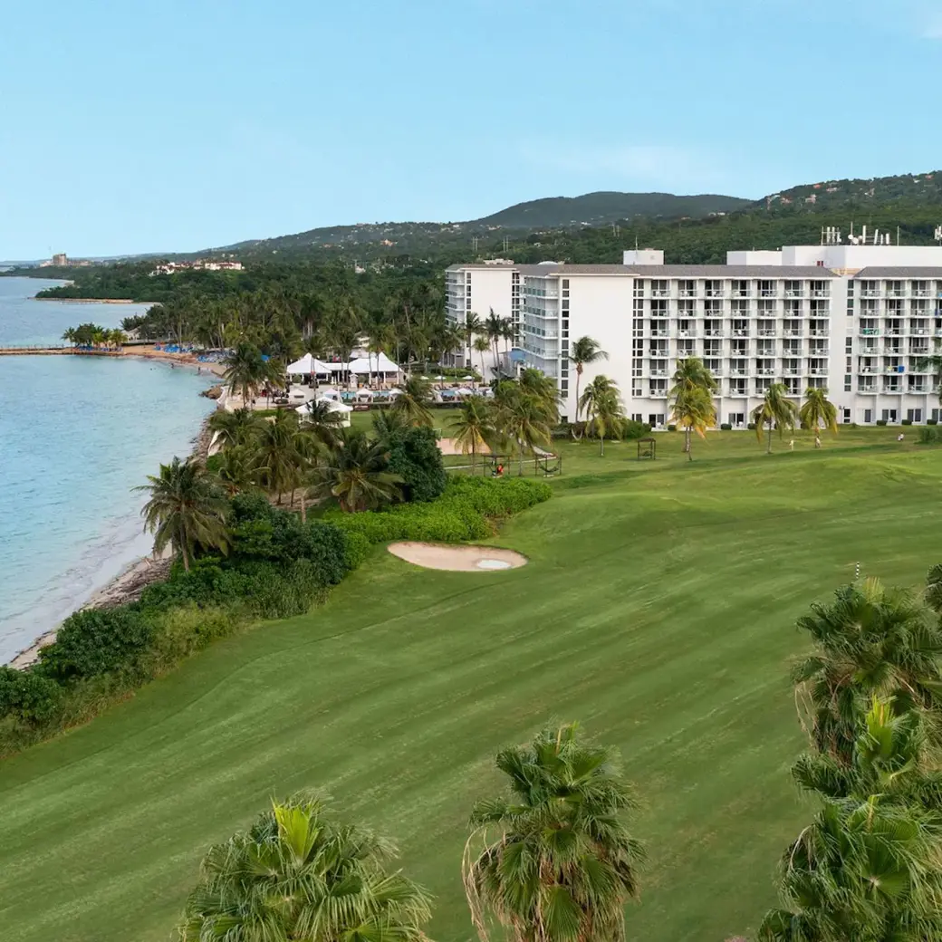 Aerial view of Dreams Rose Hall beachfront building and golf course, Montego Bay