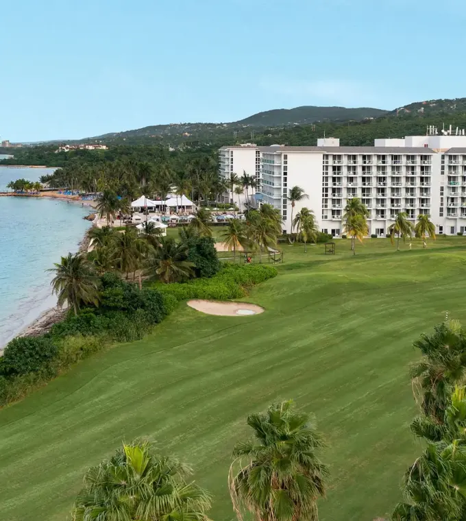 Aerial view of Dreams Rose Hall beachfront building and golf course, Montego Bay