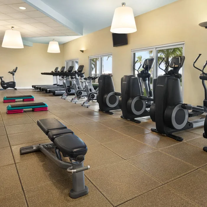 The resort's gym, well-equipped with various cardio and weight-training machines for guests to use.