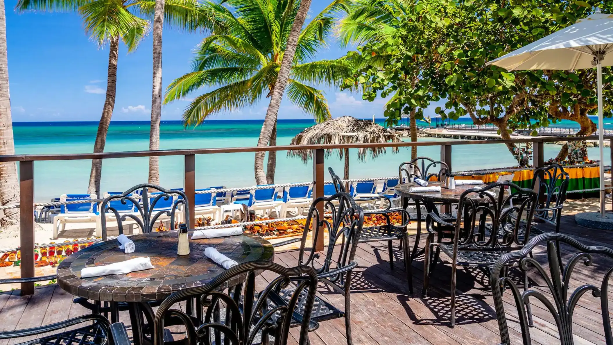 Mangoes restaurant outdoor terrace overlooking the beach at Dreams Rose Hall, Montego Bay