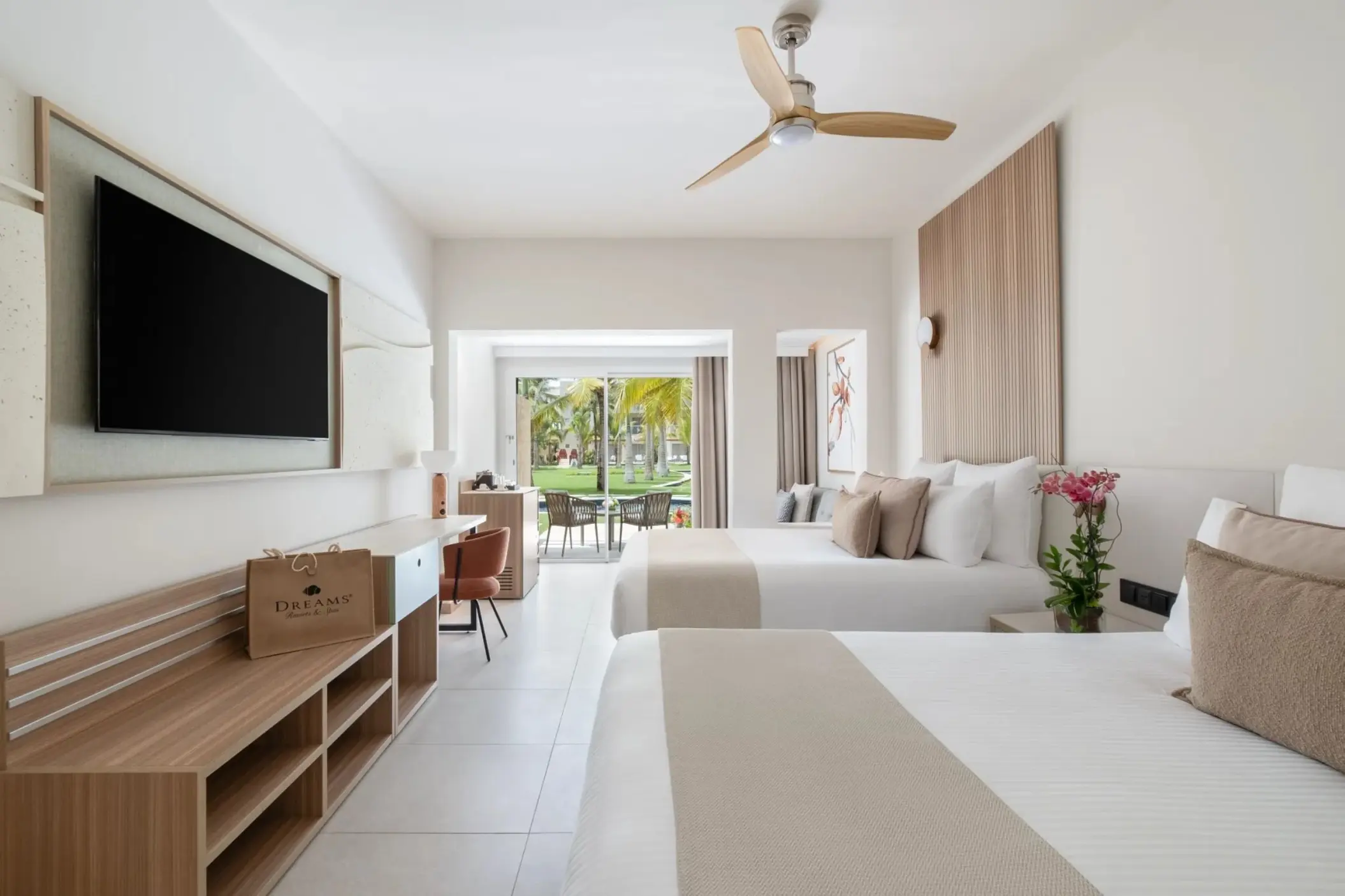 Junior suite with two beds and a private balcony at Dreams Royal Beach, Punta Cana