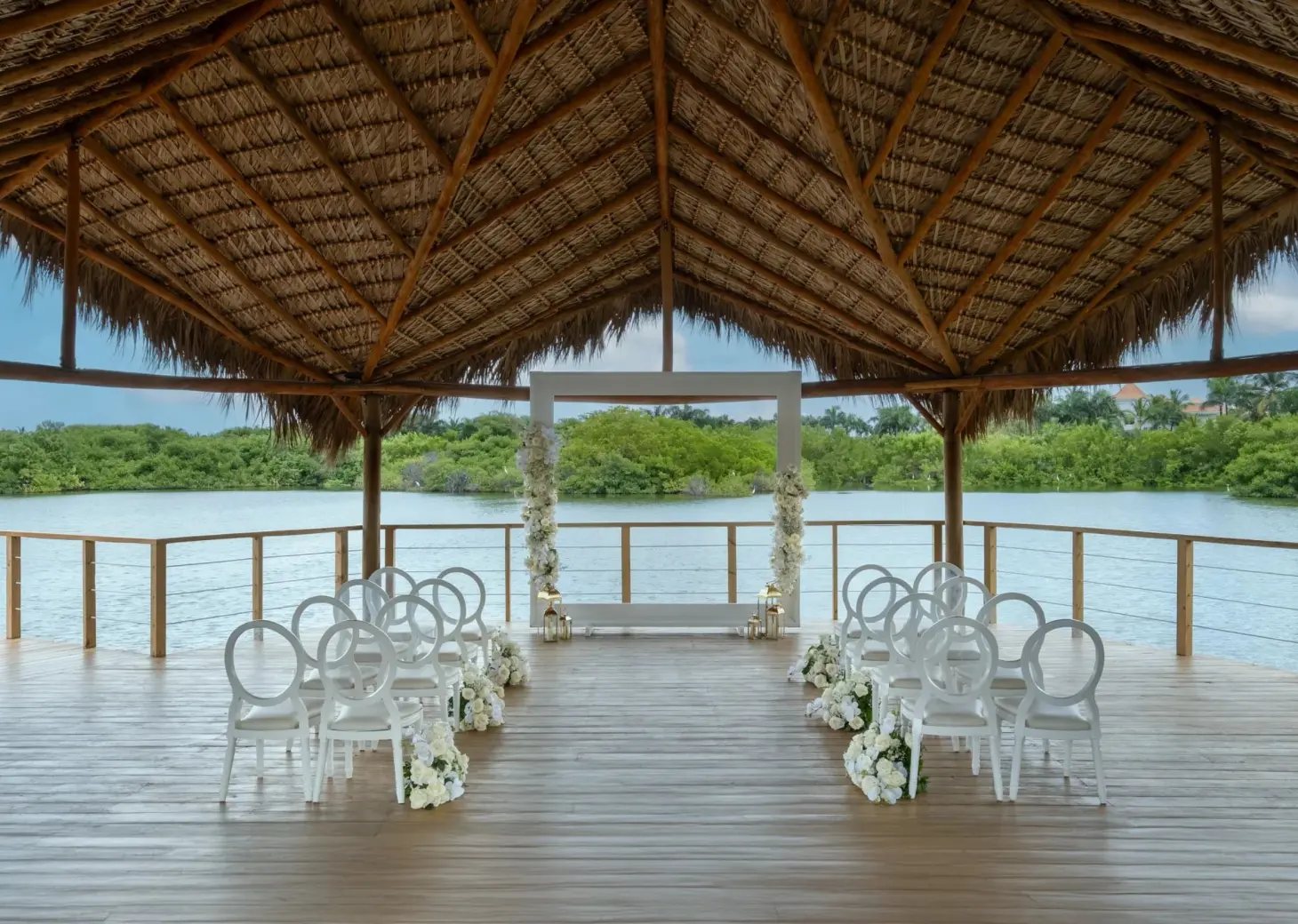 Mangrove gazebo wedding ceremony with white chairs at Dreams Royal Beach, Punta Cana