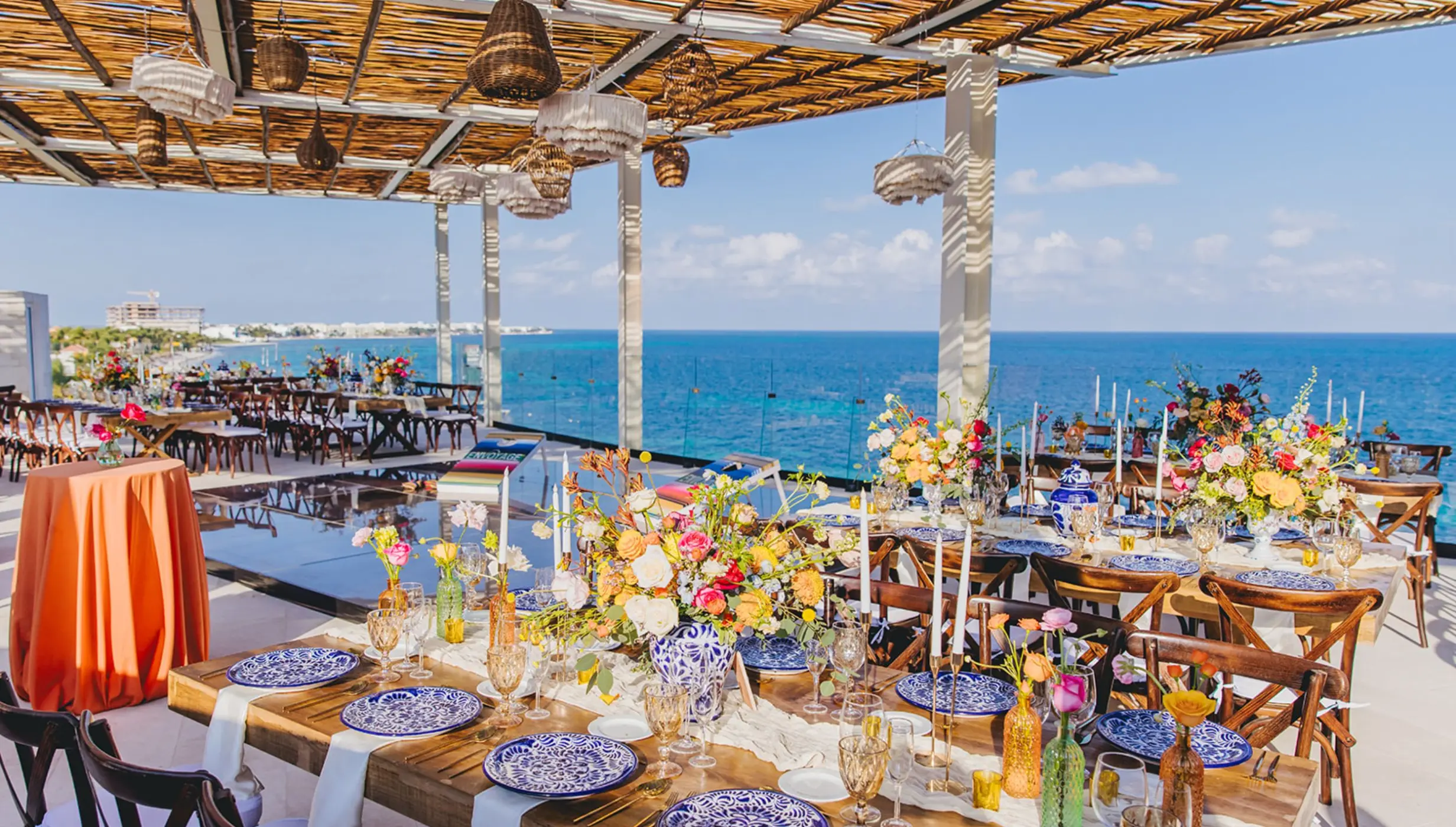 Sky rooftop wedding reception with ocean views at Dreams Sapphire, Riviera Maya