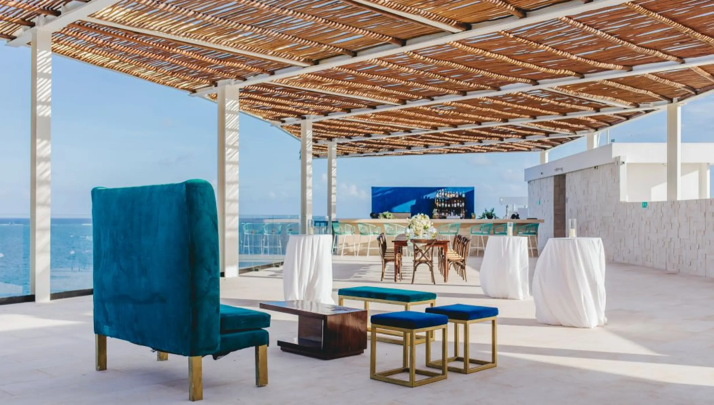 Sky rooftop wedding reception setup with ocean views at Dreams Sapphire, Riviera Maya