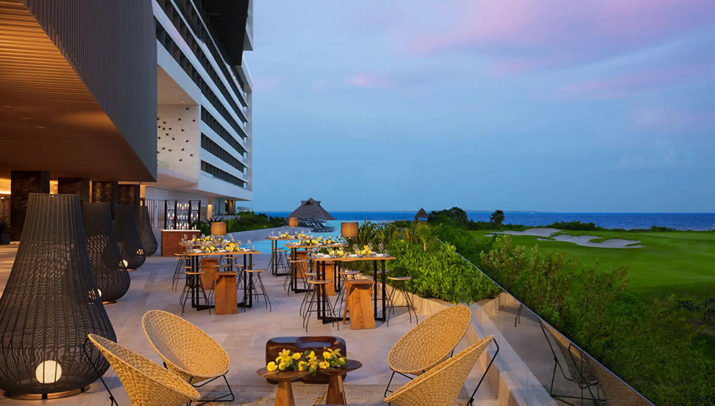 pool terrace with seating for weddings at Dreams Vista Cancun Golf and Spa