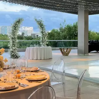 Grand Vista Terrace wedding reception at Dreams Vista Cancun with floral arches and white dance floor