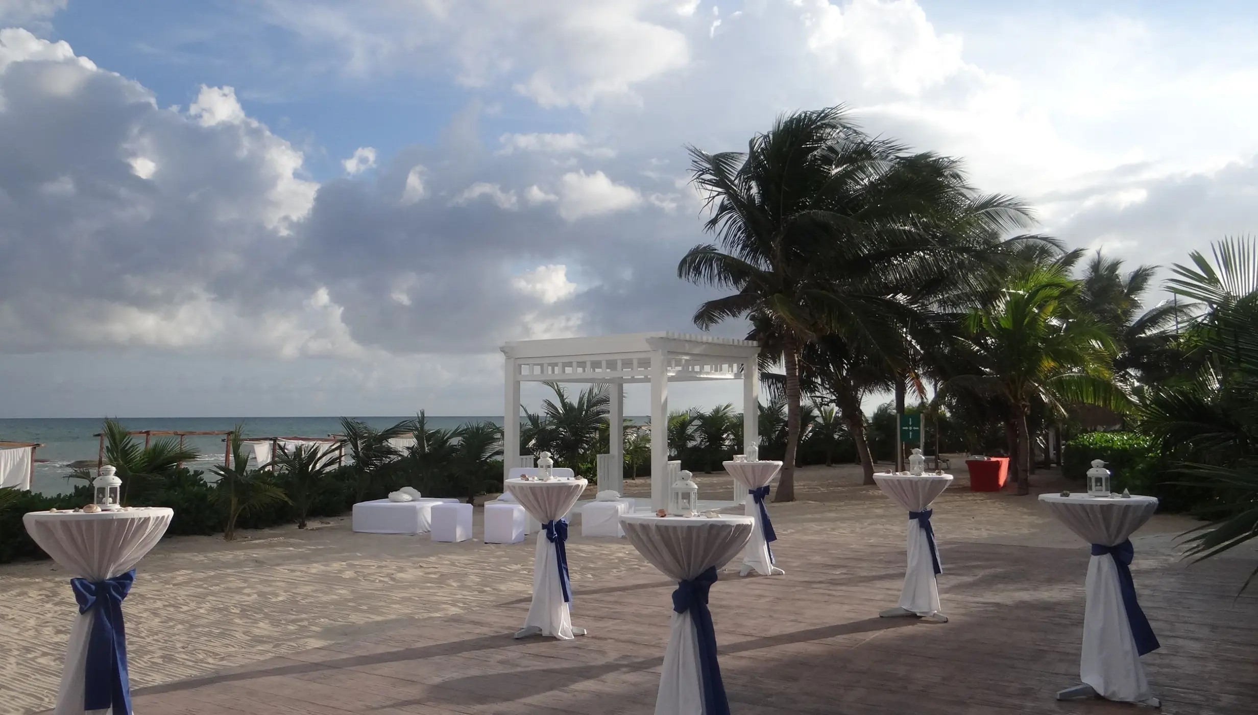 Cocktail tables and ceremony gazebo at El Dorado Royale, Riviera Maya