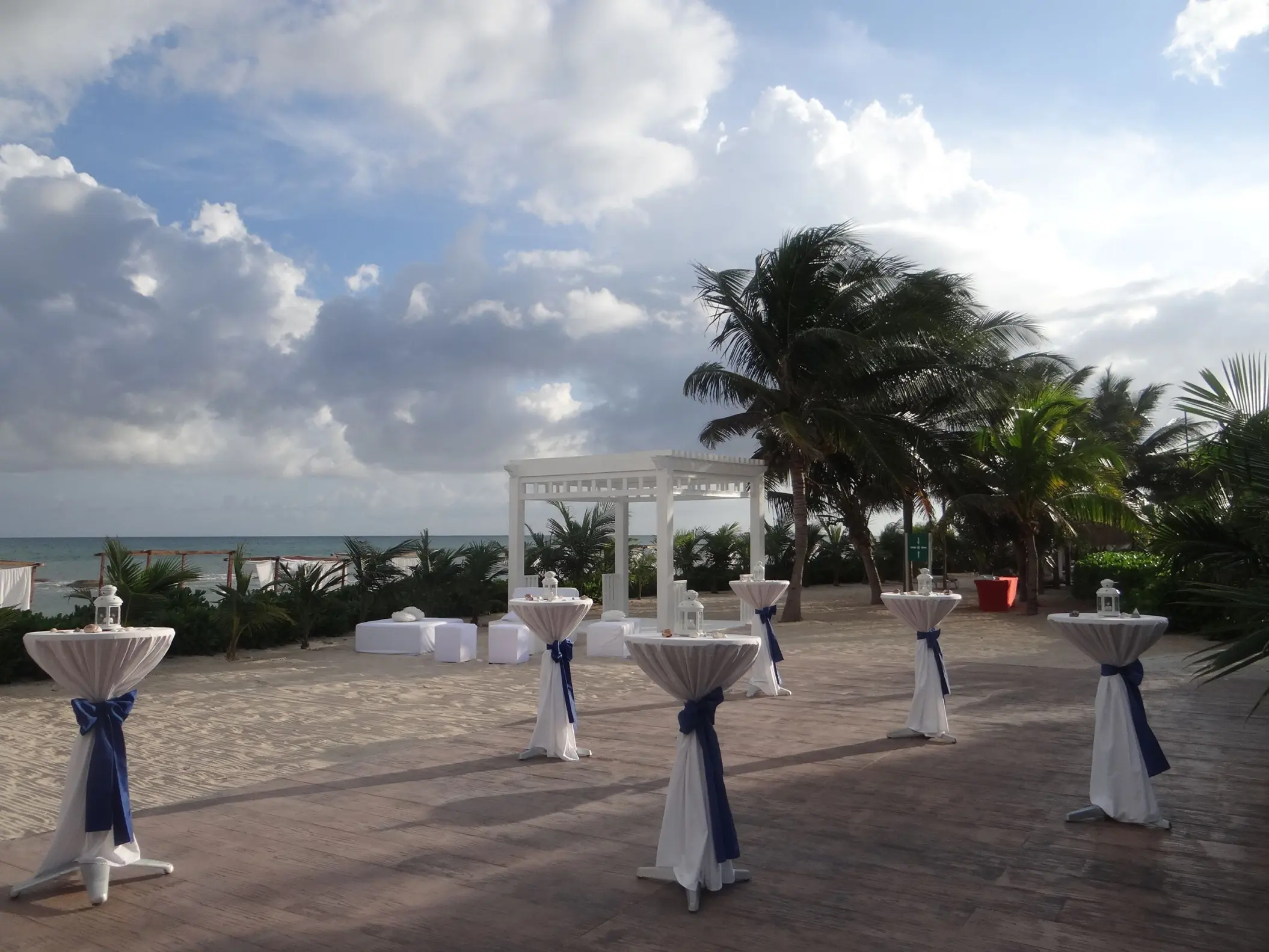 Cocktail tables and ceremony gazebo at El Dorado Royale, Riviera Maya