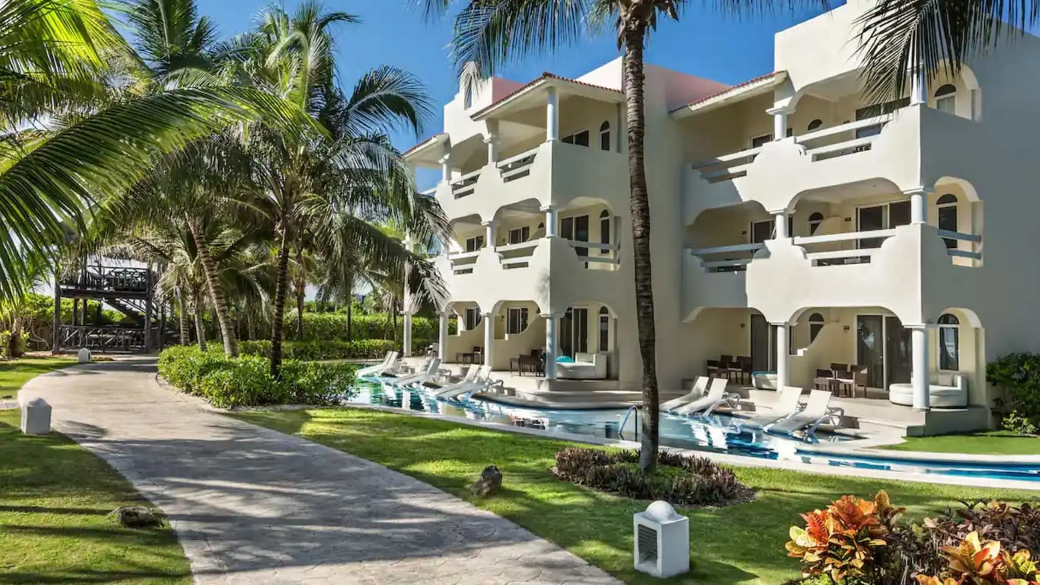 Swim-up suite exterior and walking path at El Dorado Royale, Riviera Maya